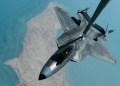 组图：美F-22战斗机现身 与电子战机并肩作战