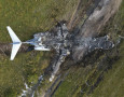 组图：美国发生飞机坠毁事故 机上21人全部生还